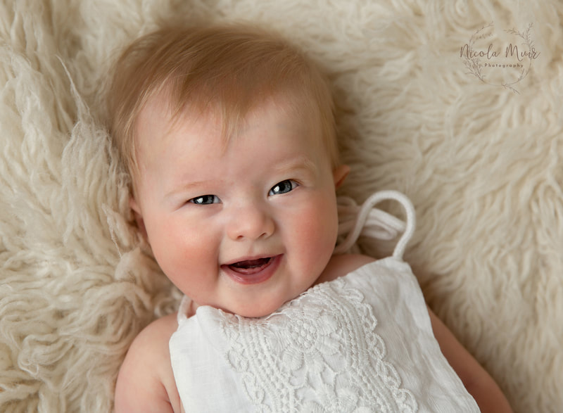 nicola muir photography portrait session baby girl 5 months old smiling  